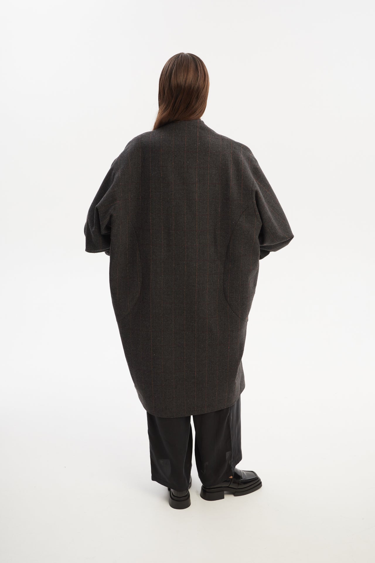 Oversized cocoon wool coat with long tapered sleeves