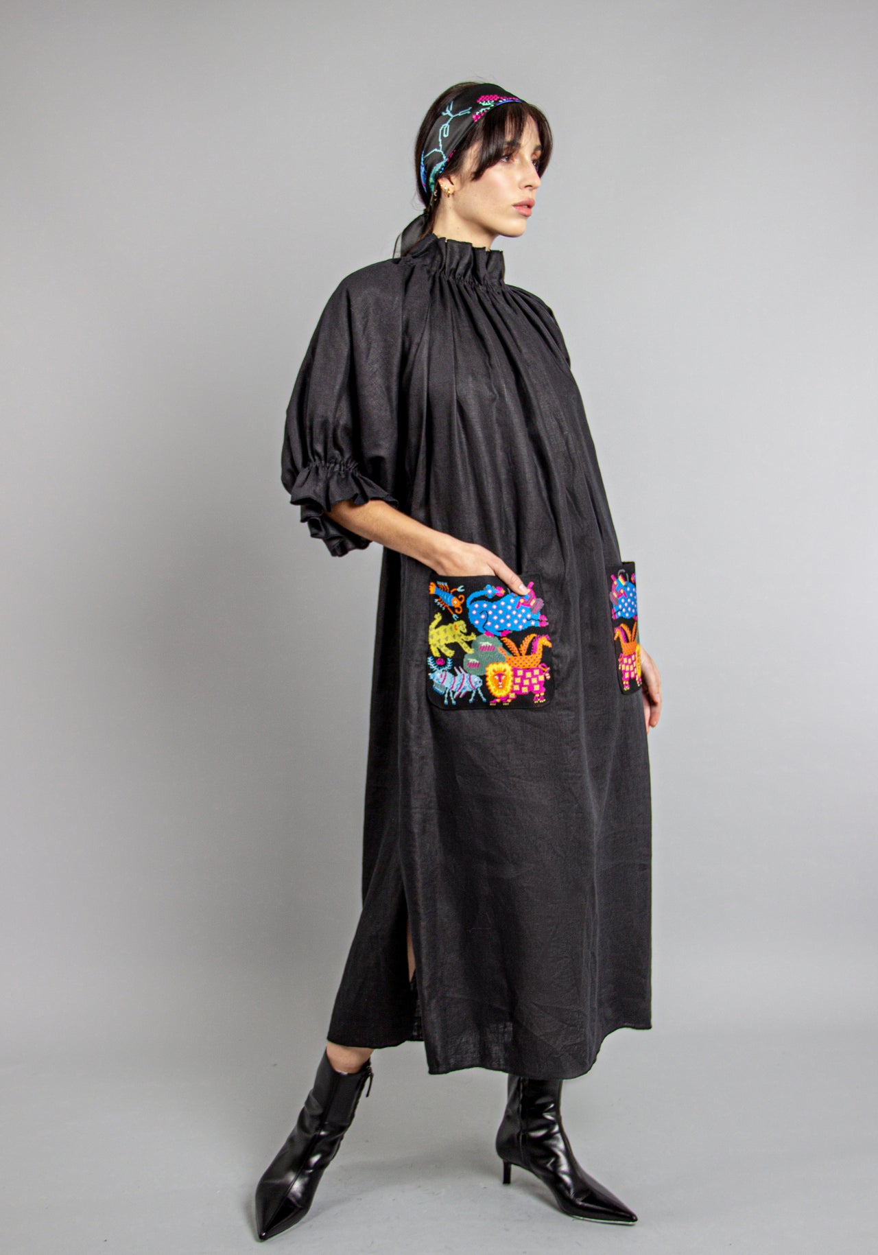 Dress with embroidered pockets
