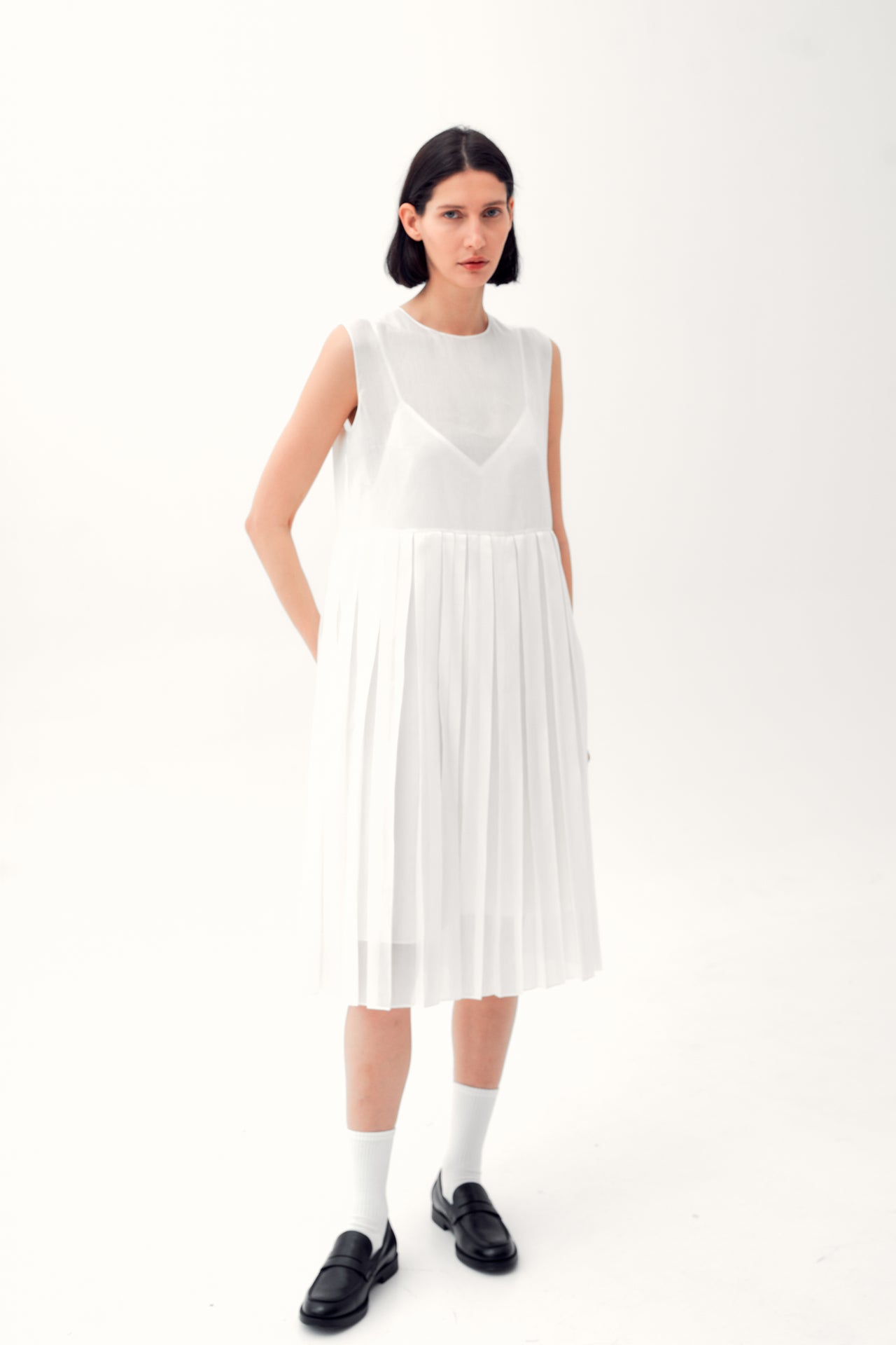 Midi dress with pleated bottom